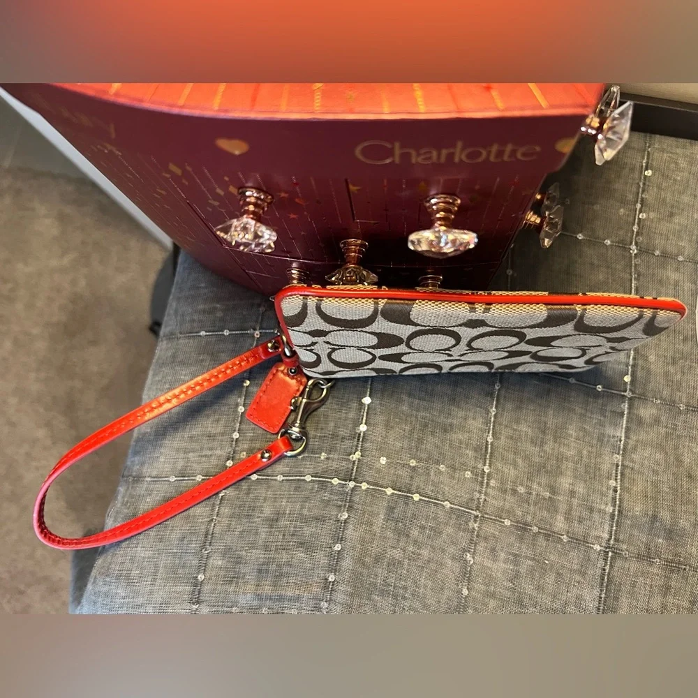 Coach Brown and Coral Wristlet with Signature C Monogram